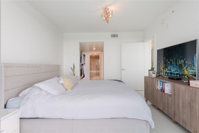 bedroom featuring ensuite bathroom