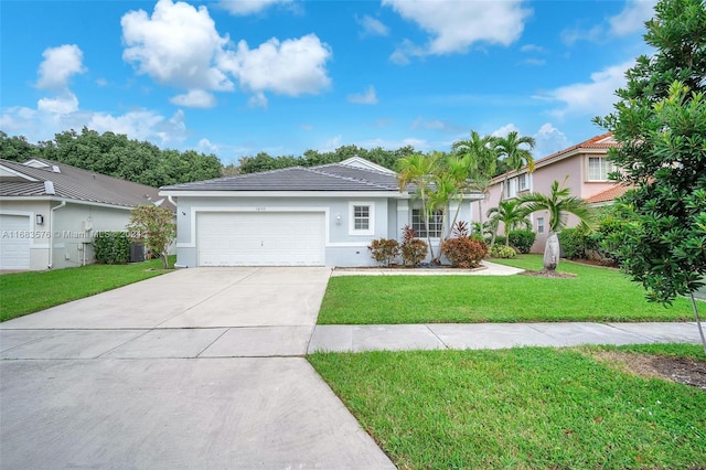 ranch-style home with a garage, central air condition unit, and a front lawn