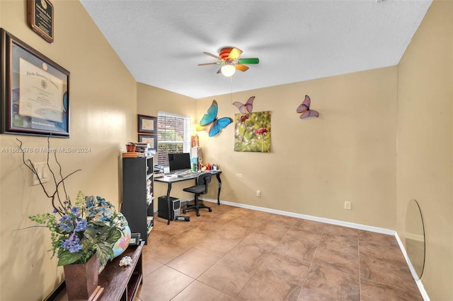 office area featuring a textured ceiling and ceiling fan