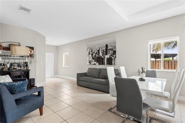 living room featuring light tile patterned flooring