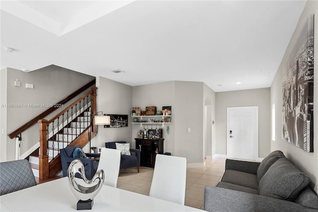 dining area featuring light tile patterned floors