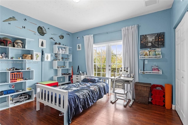 bedroom featuring a closet and wood-type flooring