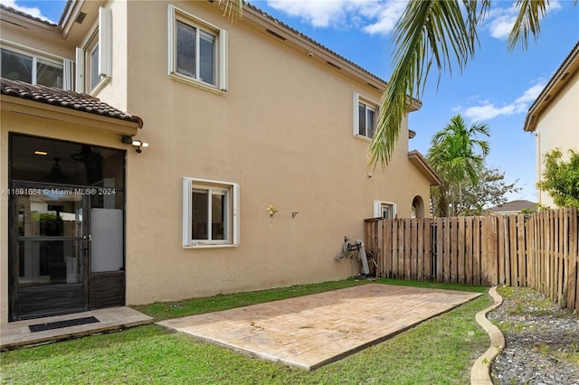 back of house featuring a patio area