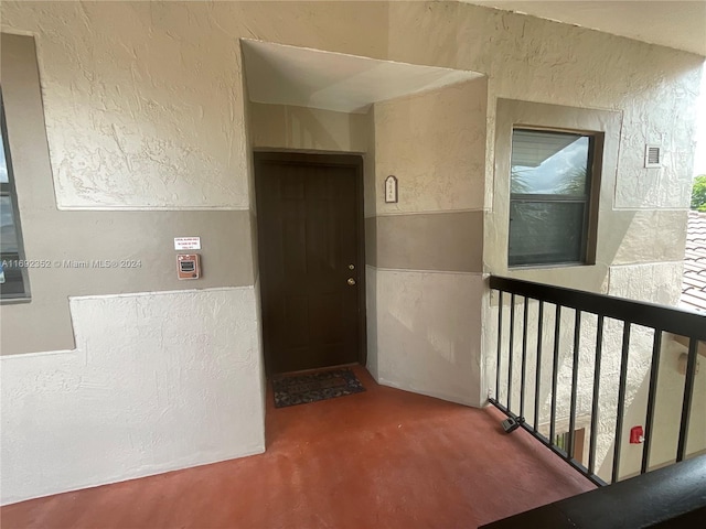 hallway featuring carpet flooring