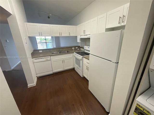 kitchen with sink, dark wood-type flooring, vaulted ceiling, white appliances, and white cabinets