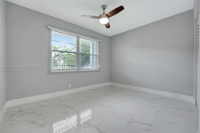 empty room featuring ceiling fan