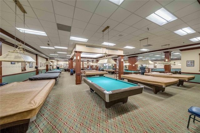 recreation room featuring light colored carpet, a drop ceiling, and billiards