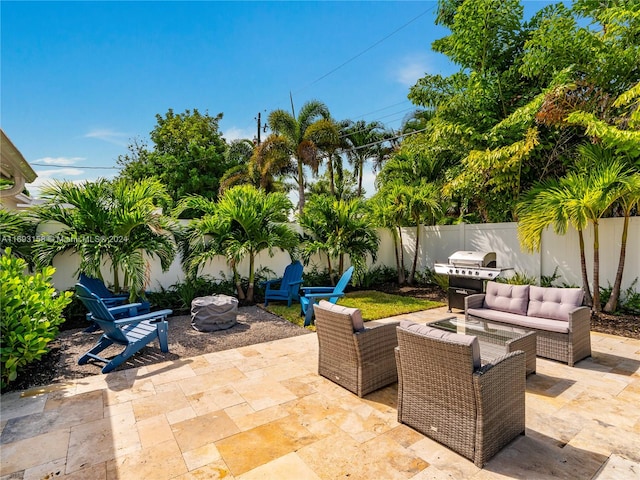 view of patio featuring an outdoor living space and a grill