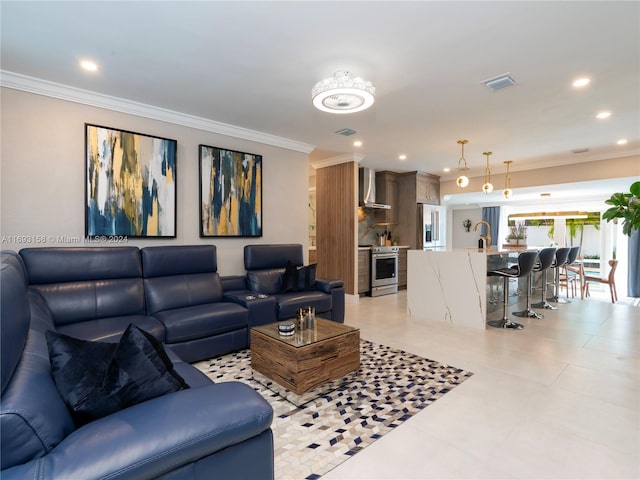 living room with ornamental molding