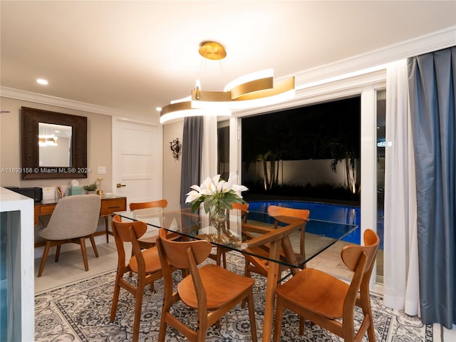 tiled dining room with crown molding