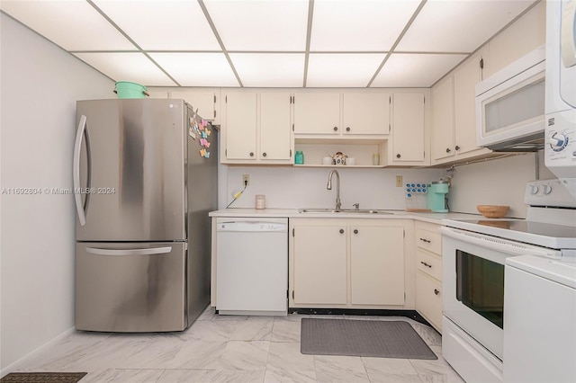 kitchen with sink and white appliances