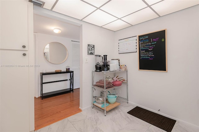 hallway featuring light hardwood / wood-style flooring