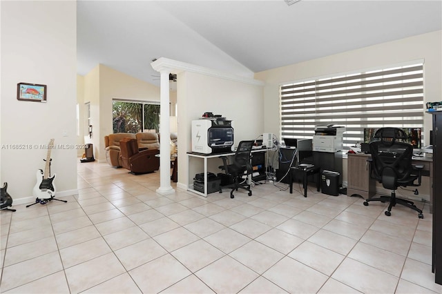 office featuring decorative columns, lofted ceiling, and light tile patterned flooring