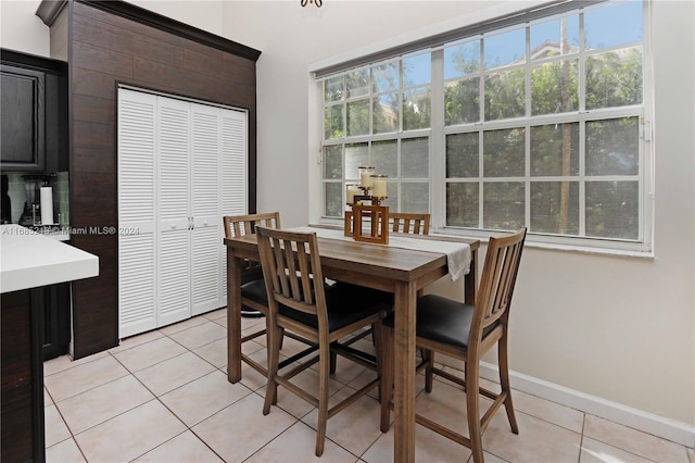 dining space with light tile patterned flooring