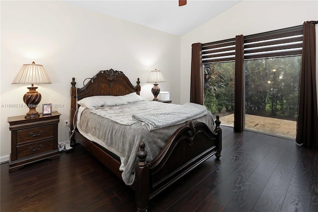 bedroom featuring access to exterior, dark hardwood / wood-style flooring, lofted ceiling, and ceiling fan