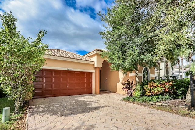 view of front of property featuring a garage