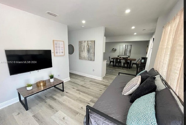 living room featuring light hardwood / wood-style floors