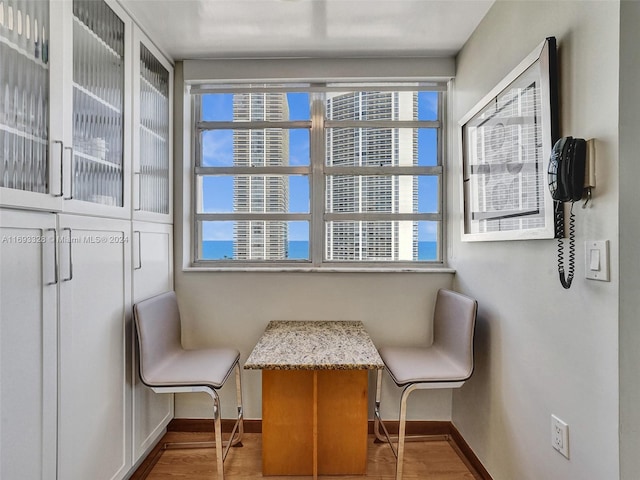 1833 S Ocean Dr Unit 1702, Hallandale Beach, FL 33009 - sitting room with baseboards, healthy amount of natural light, and wood finished floors