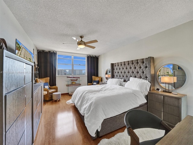 1833 S Ocean Dr Unit 1702, Hallandale Beach, FL 33009 - bedroom with light wood-style floors, a textured ceiling, and ceiling fan