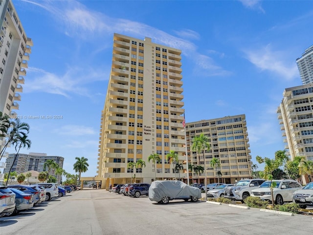 1833 S Ocean Dr Unit 1702, Hallandale Beach, FL 33009 - view of apartment building / complex featuring uncovered parking
