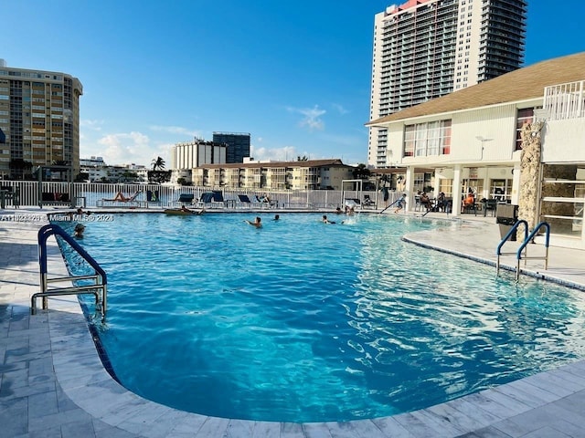1833 S Ocean Dr Unit 1702, Hallandale Beach, FL 33009 - community pool featuring a patio and fence