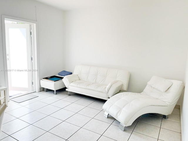 living room with light tile patterned floors