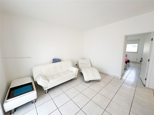 sitting room with light tile patterned flooring