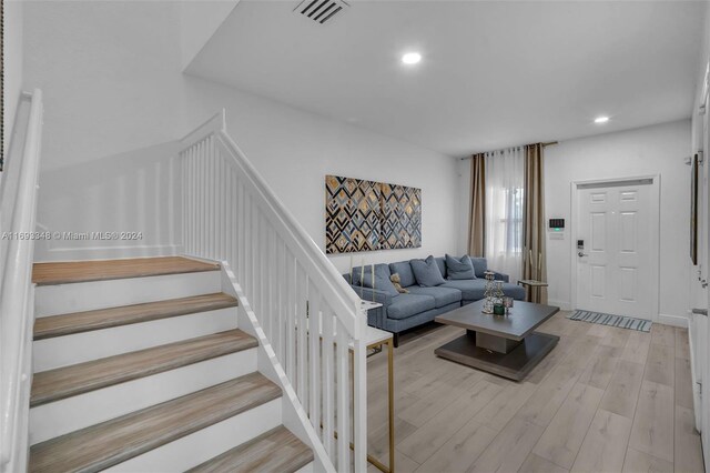 living room featuring light wood-type flooring