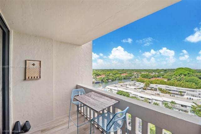 balcony featuring a water view