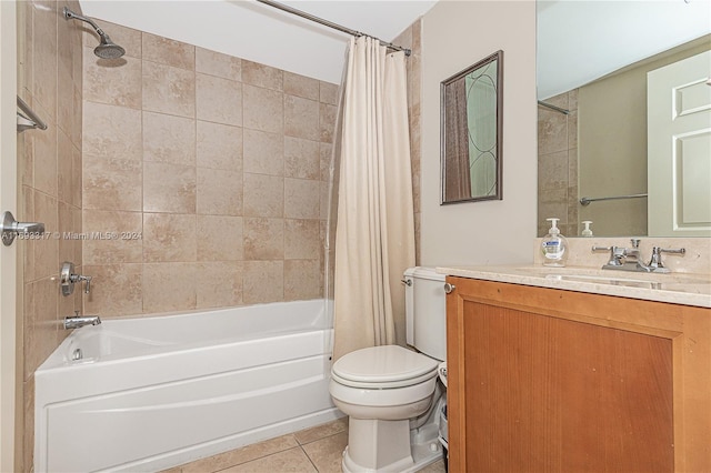 full bathroom featuring toilet, vanity, tile patterned floors, and shower / tub combo with curtain