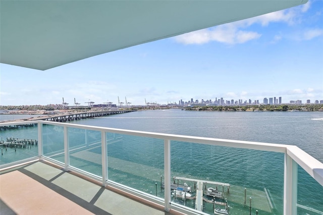 balcony featuring a water view