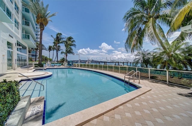 view of swimming pool featuring a patio