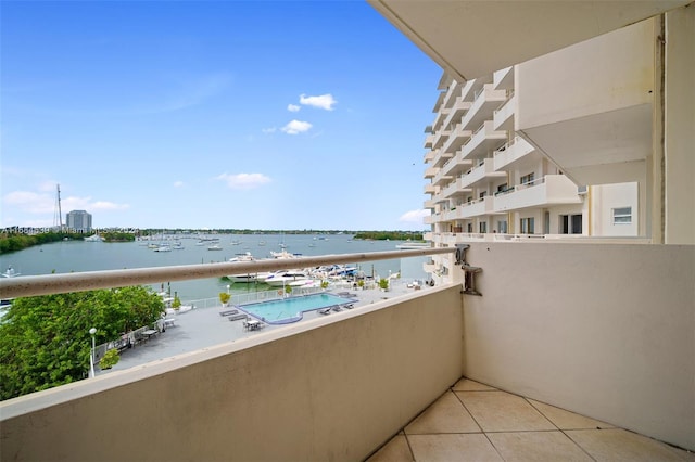 balcony featuring a water view