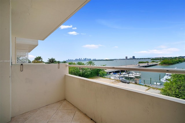 balcony featuring a water view