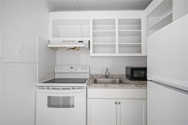 kitchen featuring white cabinets, white appliances, sink, and decorative backsplash