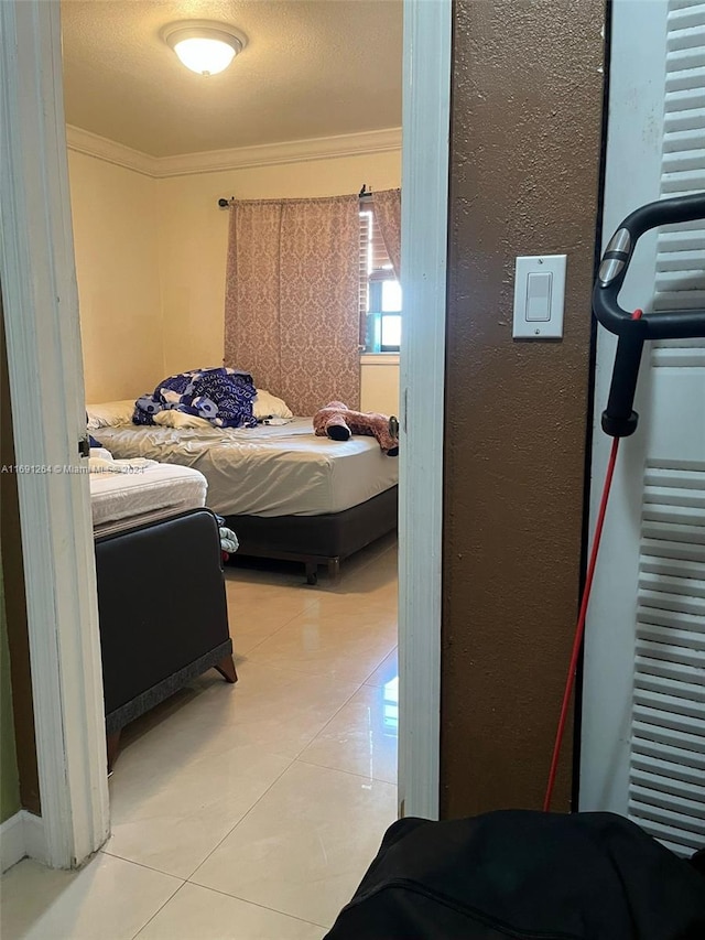 tiled bedroom with crown molding