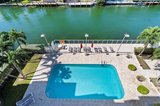 birds eye view of property featuring a water view