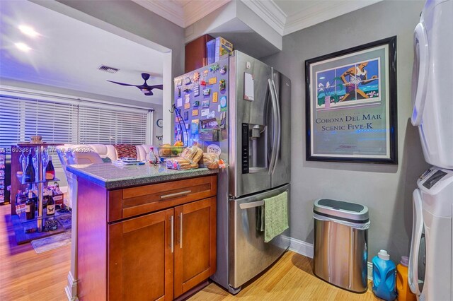 kitchen with stainless steel fridge, light hardwood / wood-style floors, ceiling fan, and crown molding