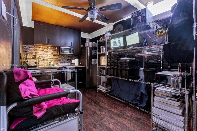 kitchen featuring appliances with stainless steel finishes, tasteful backsplash, ornamental molding, dark brown cabinetry, and dark wood-type flooring