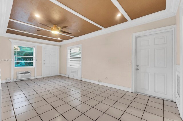 entrance foyer featuring ceiling fan, light tile patterned floors, crown molding, and a wall mounted AC