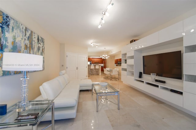 living room with a chandelier