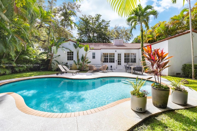 view of pool with a patio