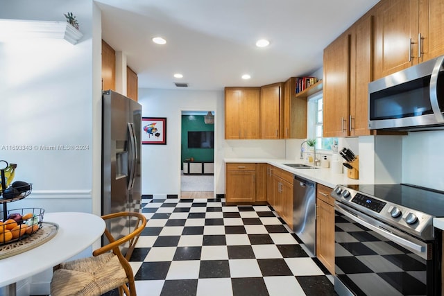 kitchen with sink and appliances with stainless steel finishes