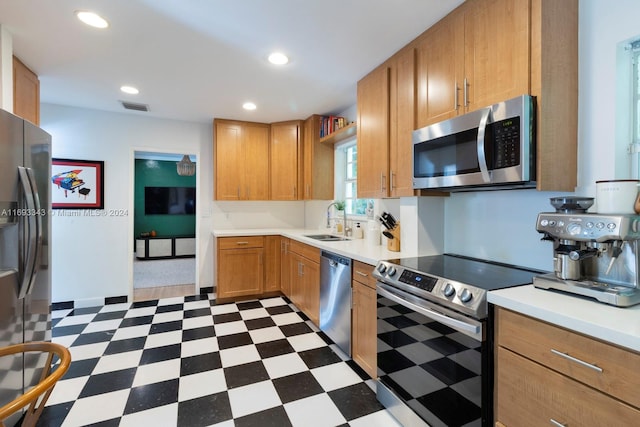 kitchen featuring sink and appliances with stainless steel finishes