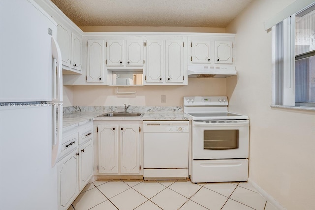 608 SW Natura Blvd Unit 311, Deerfield Beach, FL 33441 - kitchen featuring white appliances, under cabinet range hood, light countertops, white cabinetry, and a textured ceiling