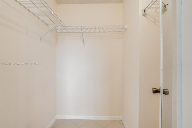 608 SW Natura Blvd Unit 311, Deerfield Beach, FL 33441 - spacious closet with light tile patterned floors