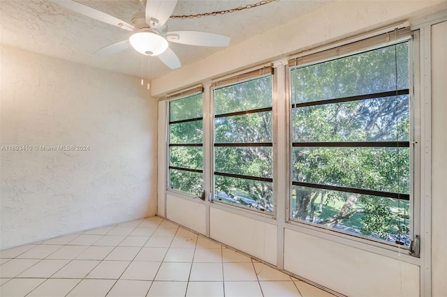 608 SW Natura Blvd Unit 311, Deerfield Beach, FL 33441 - unfurnished room featuring a ceiling fan and a textured wall