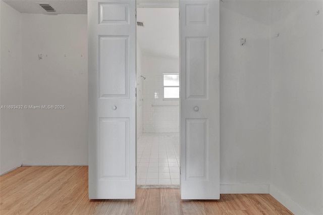 closet featuring visible vents