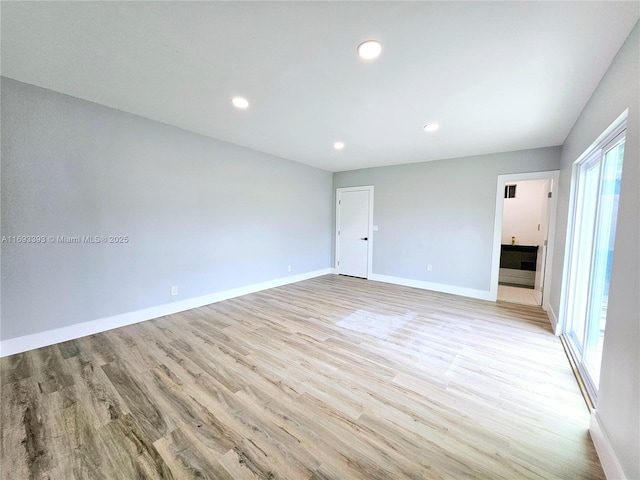 empty room featuring light wood-type flooring