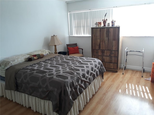 bedroom featuring light wood-type flooring